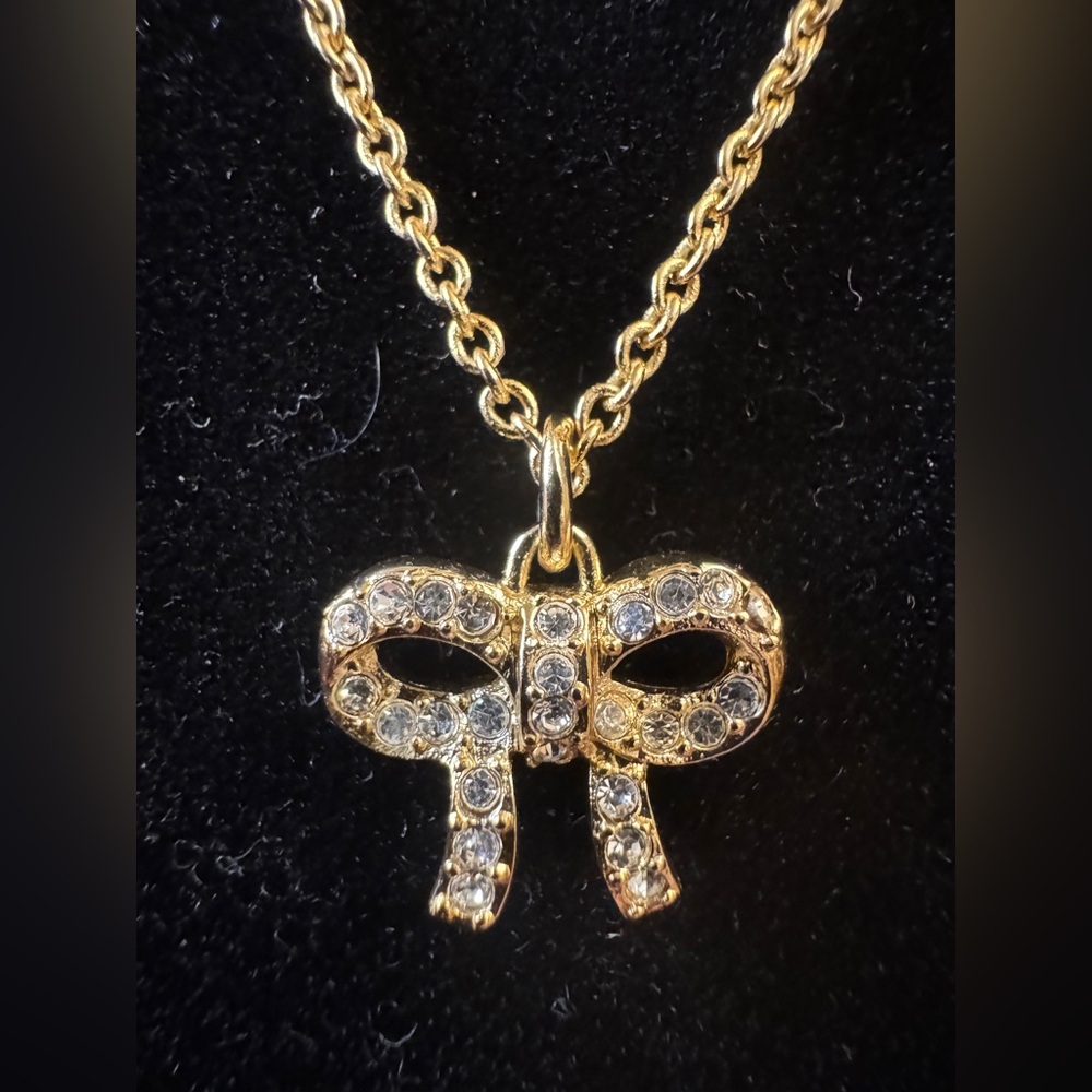 Coach Elegant Gold Rhinestone Bow Pendant Necklace
